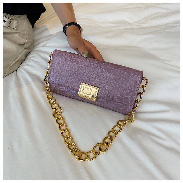 Eine Schulter- und Unterarmtasche Damen Baguette Bag