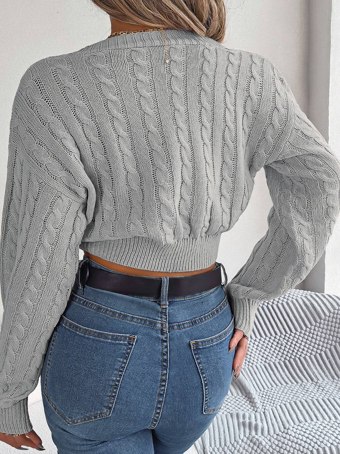 Pullover mit V-Ausschnitt und Zopfmuster