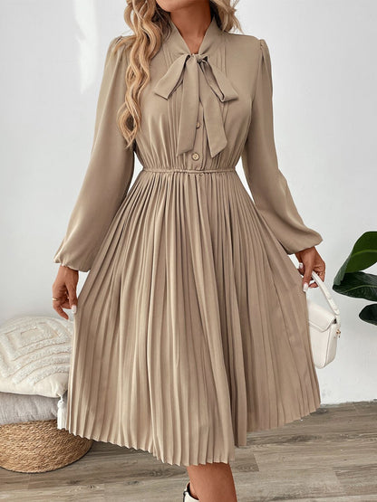 Perfee Pleated Tie Neck Long Sleeve Dress - Siennasass