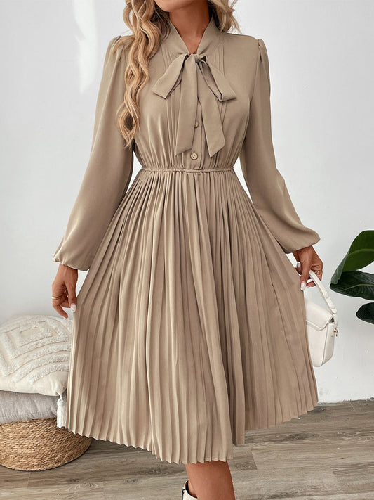 Perfee Pleated Tie Neck Long Sleeve Dress - Siennasass