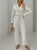 Striped Notched Long Sleeve Tie Waist Jumpsuit - Siennasass