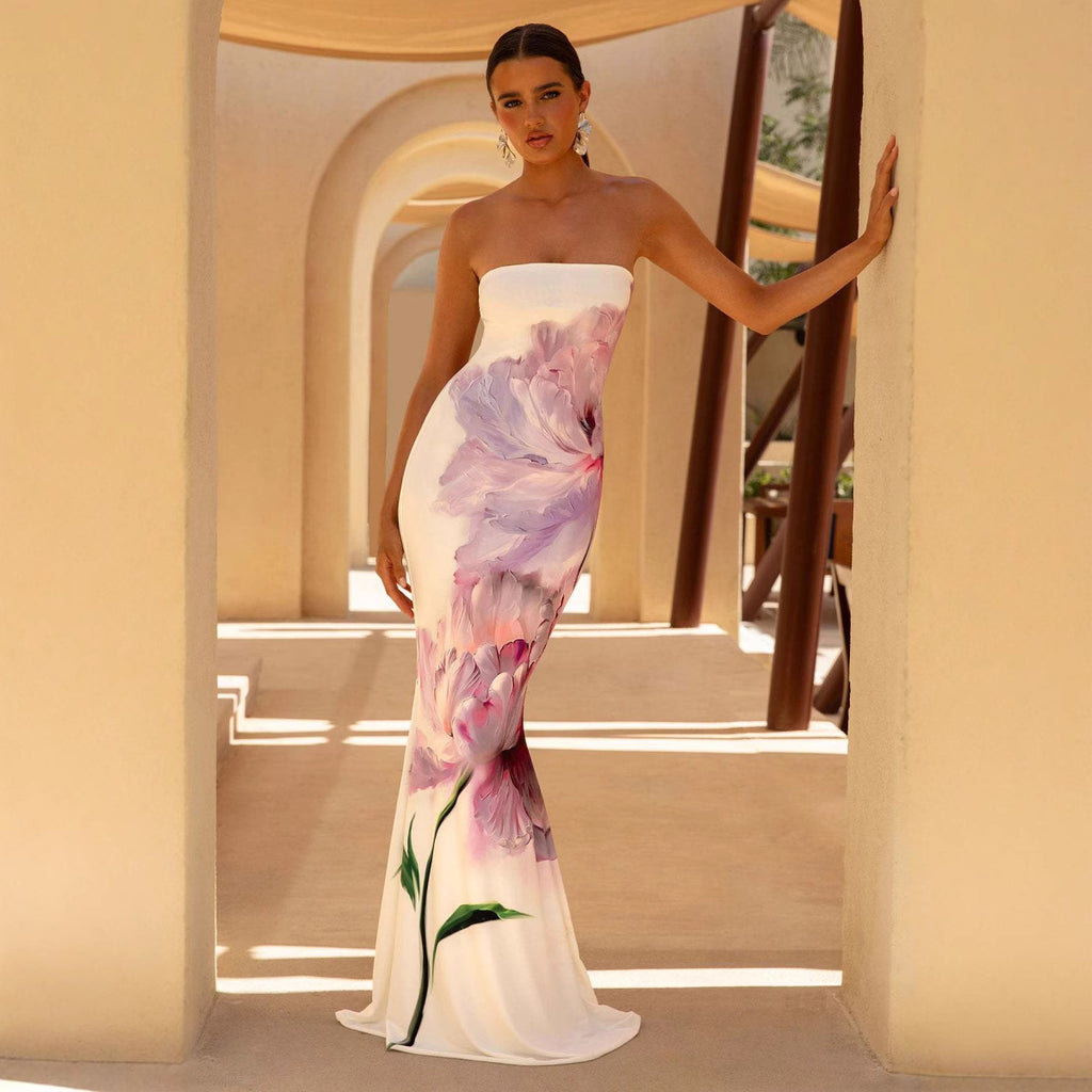 Luxury strapless maxi dress in sunset ombre and floral prints, featuring a slim-fit bodycon silhouette for resort wear
