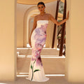 Luxury strapless maxi dress in sunset ombre and floral prints, featuring a slim-fit bodycon silhouette for resort wear