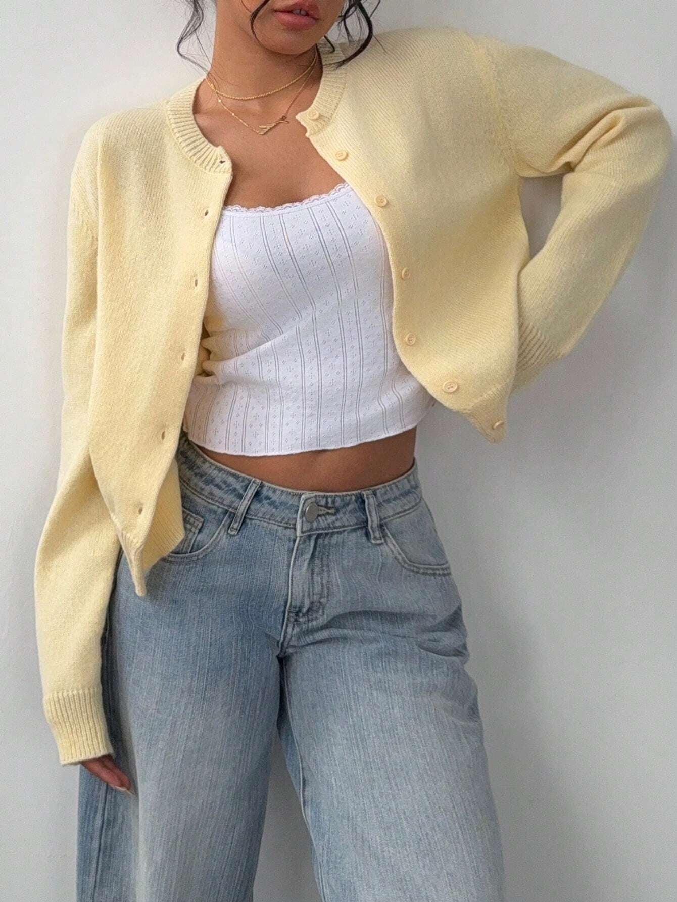 Back view of the solid color long sleeve women's slim fit knitted cardigan.