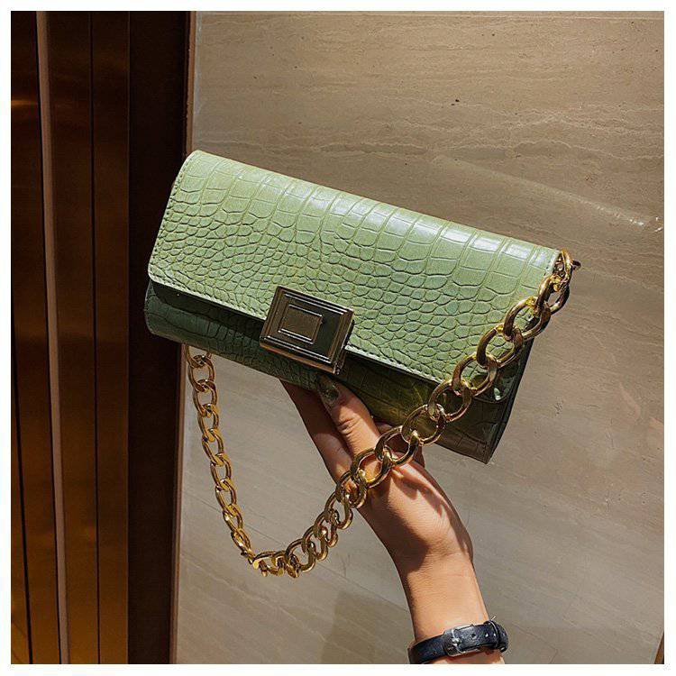 Eine Schulter- und Unterarmtasche Damen Baguette Bag