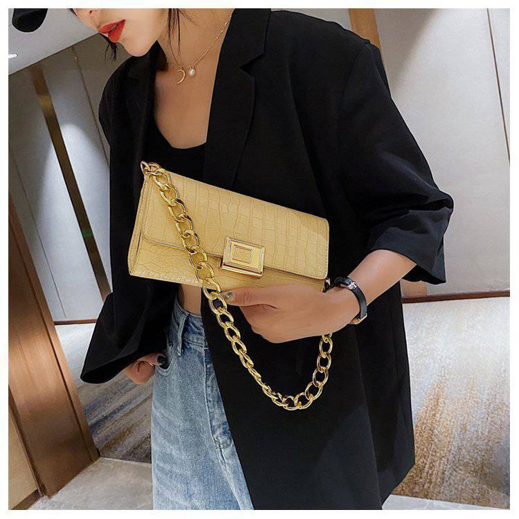 Eine Schulter- und Unterarmtasche Damen Baguette Bag