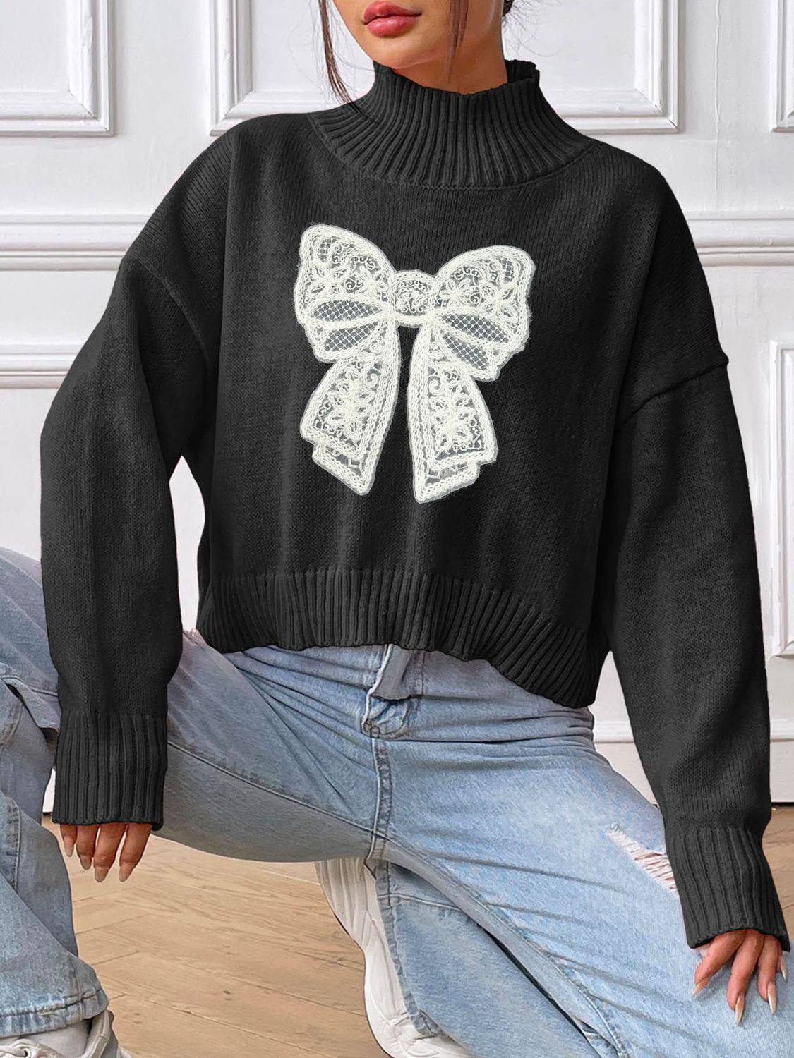 Rollkragenpullover mit Schleife und langem Arm